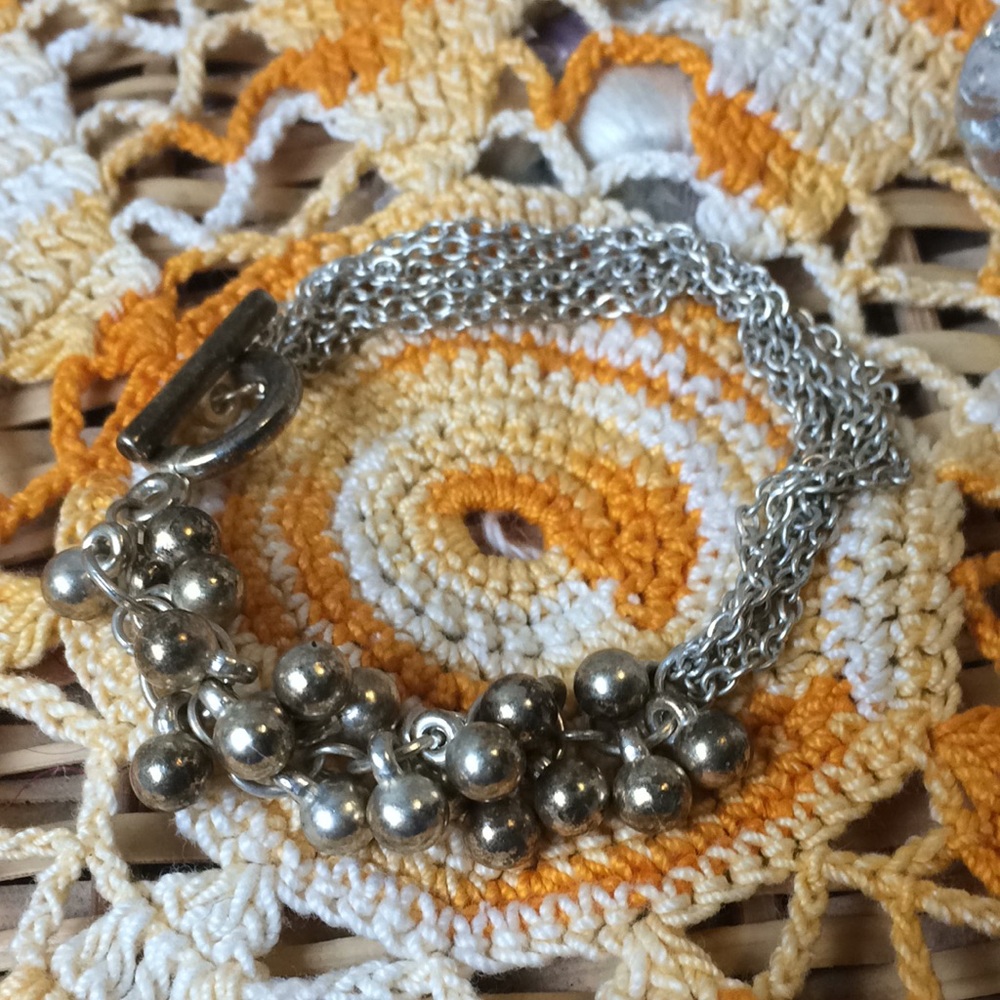 Loop latch metal beads and chains bracelet